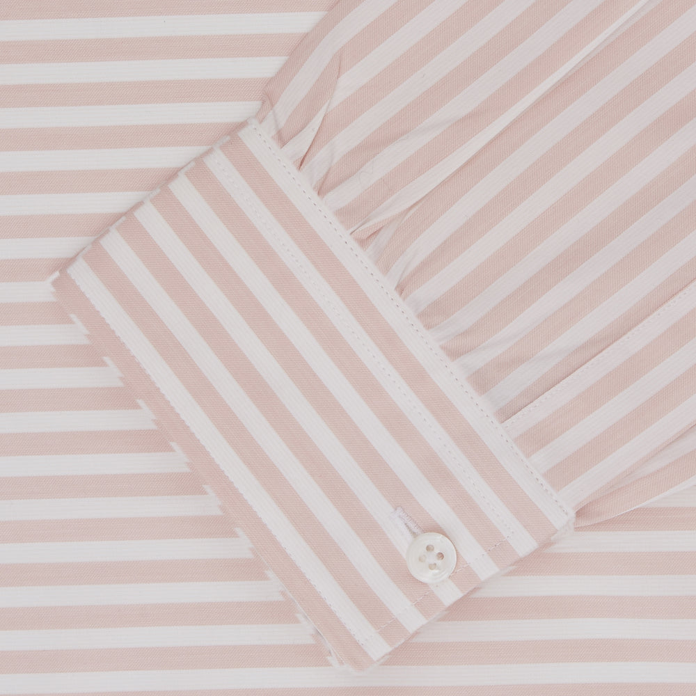 The Turnbull & Asser Weekend Fit Pink Stripe Cotton Shirt features a Dorset collar, 1-button cuffs, and light pink and white vertical stripes—perfect for the season.