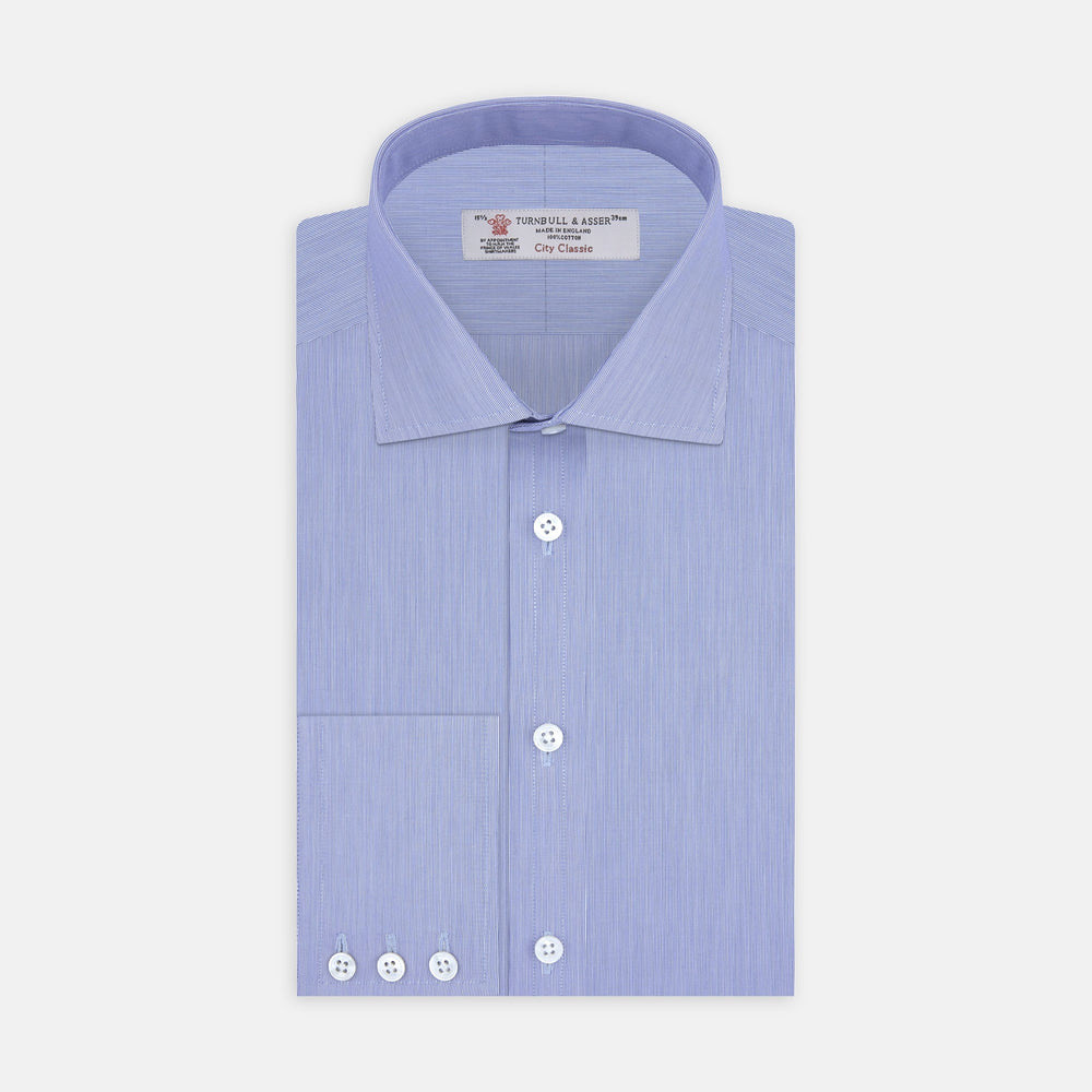 A Turnbull & Asser Blue Hairline Stripe Shirt with a Regent collar and 3-button cuffs is neatly folded, white label visible inside the collar, and displayed on a plain white background.