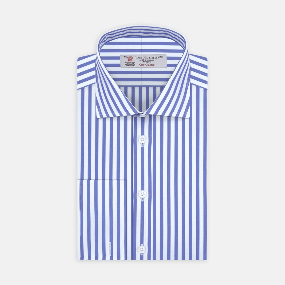The Turnbull & Asser Blue and White Candy Stripe Shirt features a Regent collar, double cuffs, and white buttons, neatly folded against a plain white background.