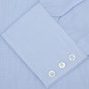 View 2 of product The Turnbull & Asser Blue Hairline Stripe Shirt features a T&A collar and 3-button cuffs, neatly folded with white buttons, shown on a plain white background—ideal as an office shirt.