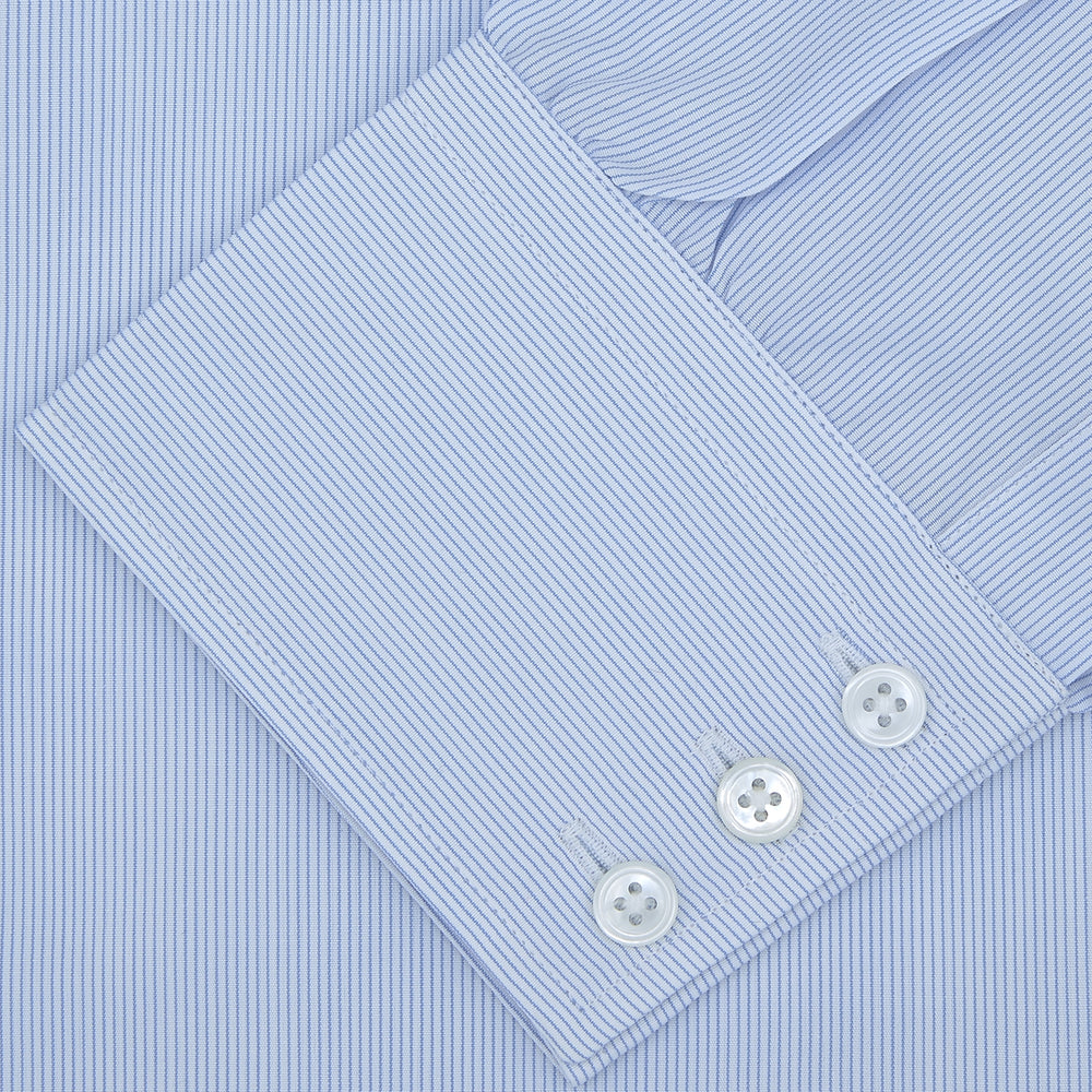 The Turnbull & Asser Blue Hairline Stripe Shirt features a T&A collar and 3-button cuffs, neatly folded with white buttons, shown on a plain white background—ideal as an office shirt.
