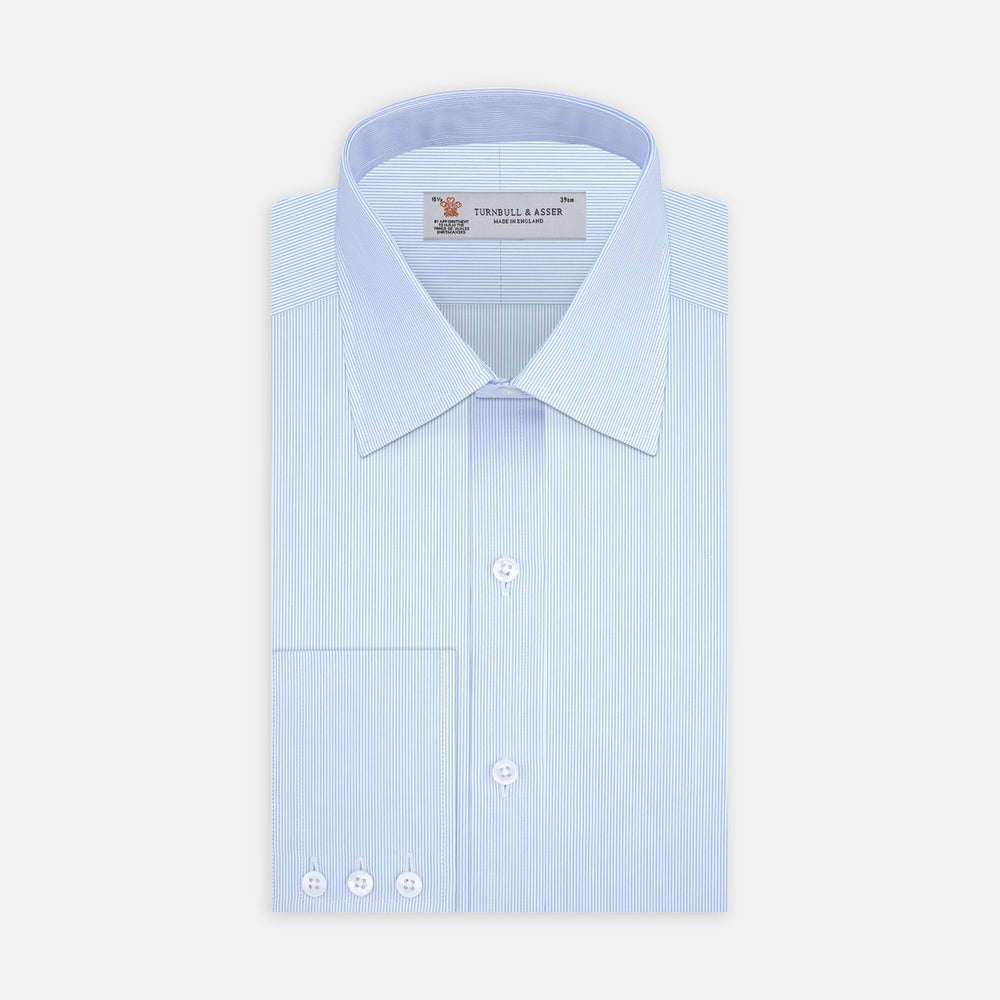 The Turnbull & Asser Blue Hairline Stripe Shirt features a T&A collar, double cuffs, white buttons, and a crisp design—ideal for the office. Displayed neatly folded on a plain white background.