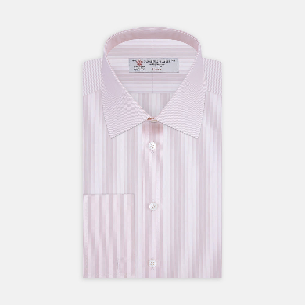 The Turnbull & Asser Pink Hairline Stripe Cotton Shirt features a T&A collar, double cuffs, neat vertical stripes, white buttons, and a chest pocket—perfect for the office. Shown neatly folded on a plain white background.