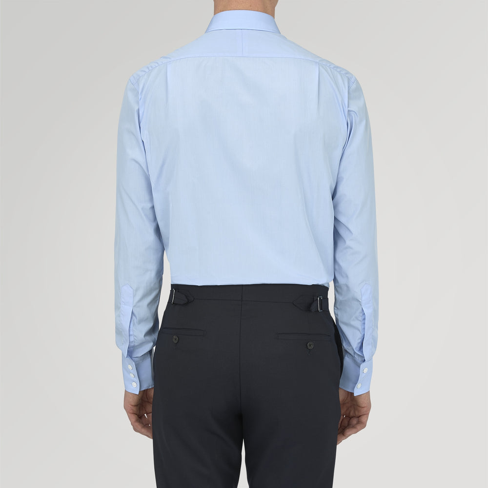 The Turnbull & Asser Two-Fold 200 Blue Cotton Shirt features a T&A collar, 3-button cuffs, and white buttons—a refined men's dress shirt displayed on a plain white background.