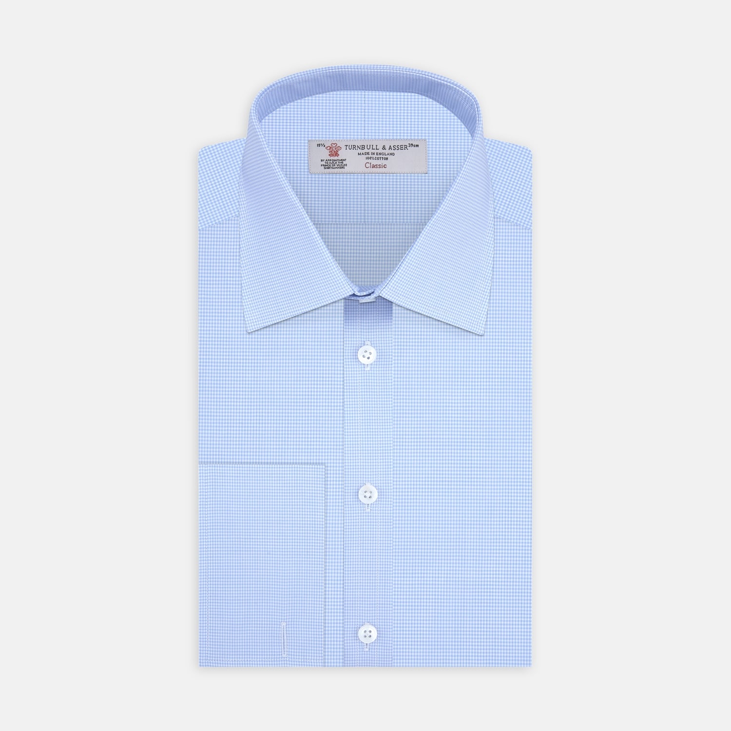 View 1 of product A Turnbull & Asser Sky Blue Micro-Check Shirt with T&A collar, double cuffs, and white buttons is neatly folded and displayed against a plain white background.