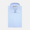 View 1 of product The Turnbull & Asser Light Blue Herringbone Superfine Cotton Shirt features a T&A collar, double cuffs, and is neatly folded against a plain white background.