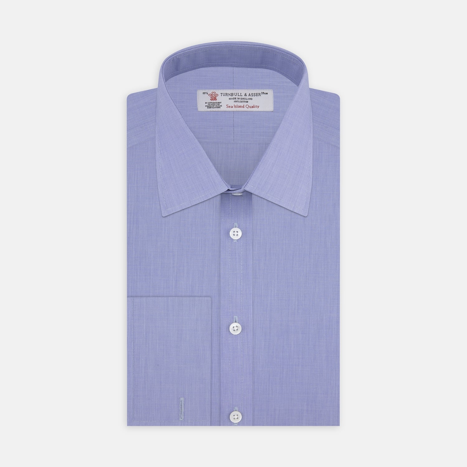 View 1 of product A neatly folded dark blue Sea Island quality cotton shirt by Turnbull & Asser, featuring a T&A collar, double cuffs, and white buttons, is displayed against a plain white background.
