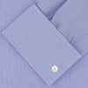 View 2 of product A neatly folded dark blue Sea Island quality cotton shirt by Turnbull & Asser, featuring a T&A collar, double cuffs, and white buttons, is displayed against a plain white background.