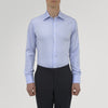 View 2 of product The Blue Herringbone Sea Island Quality Cotton Shirt by Turnbull & Asser features a T&A collar, 3-button cuffs, and is crafted from luxurious cotton. The shirt is displayed neatly folded on a plain white background.
