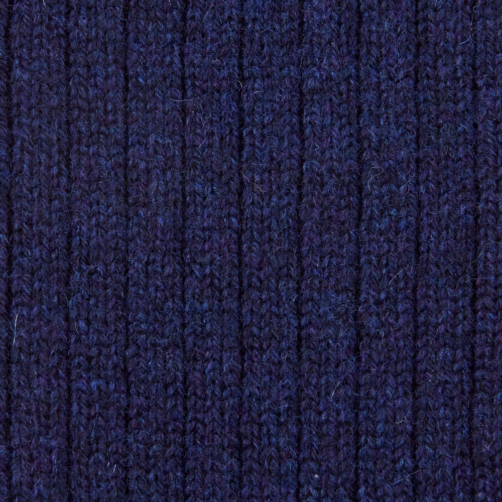 A single Turnbull & Asser Navy 3/4 Length Cashmere Sock is displayed on a white background, featuring a ribbed, fitted shape with subtle texture and breathable comfort for all-day wear.