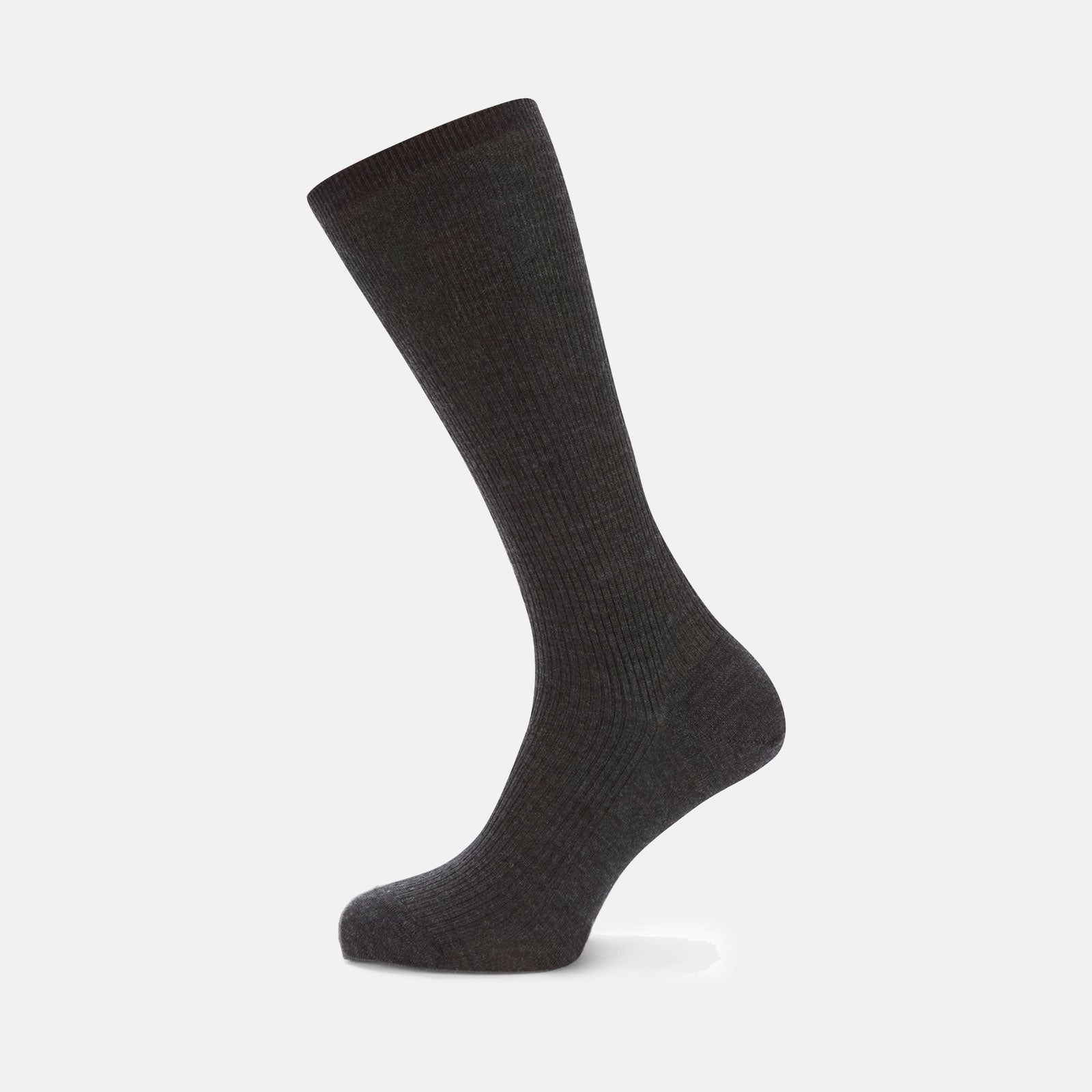 View 1 of product A single Charcoal Mid-Length Merino Wool Sock by Turnbull & Asser stands upright on a light gray background, its dark ribbed fabric and angled foot showcased.