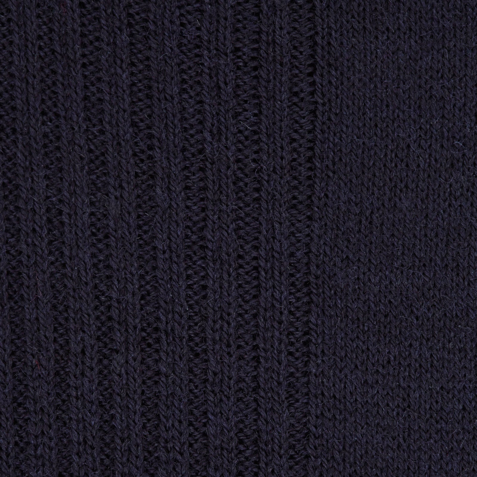 View 2 of product A single Deep Navy Mid-Length Merino Wool Sock from Turnbull & Asser stands upright on a white background, showcasing the comfort and timeless style characteristic of luxury men's socks.