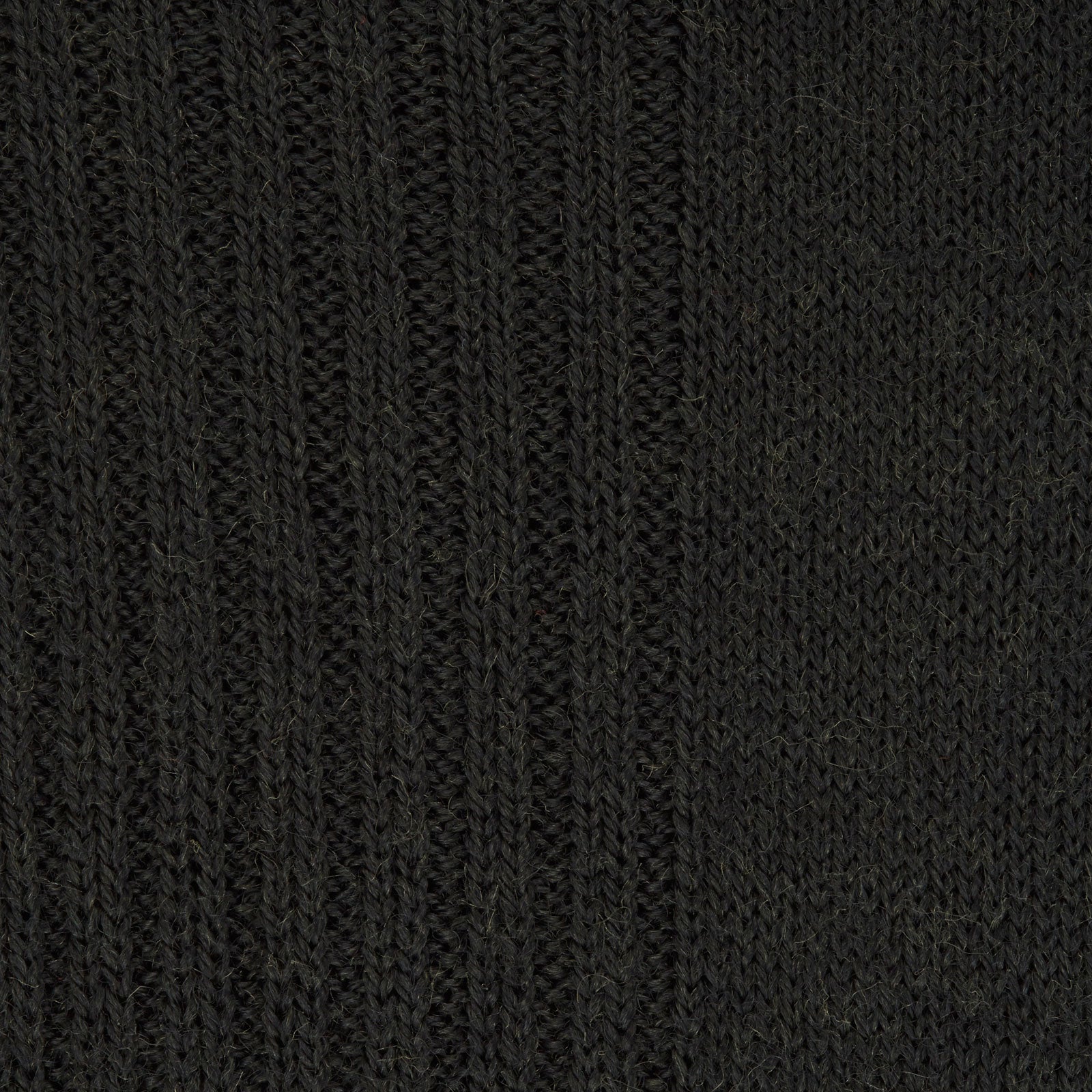 View 2 of product The Turnbull & Asser Racing Green Mid-Length Merino Wool Sock is shown upright on a light gray background, highlighting its refined style and luxurious quality for men.