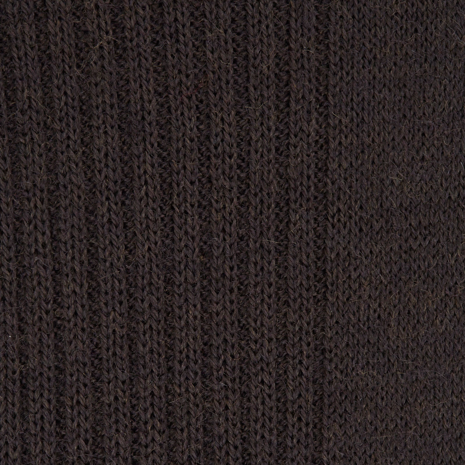 View 2 of product A single Chocolate Brown Mid-Length Merino Wool Sock by Turnbull & Asser is displayed upright against a plain white background, showcasing its luxury men’s sock style.