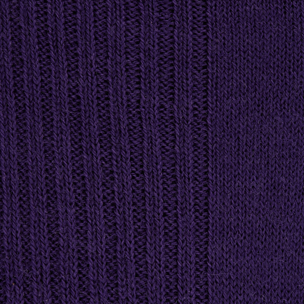 A single Turnbull & Asser Dark Purple Mid-Length Merino Wool Sock stands upright on a plain light gray background, showcasing its ribbed texture and reinforced toe and heel for premium quality.