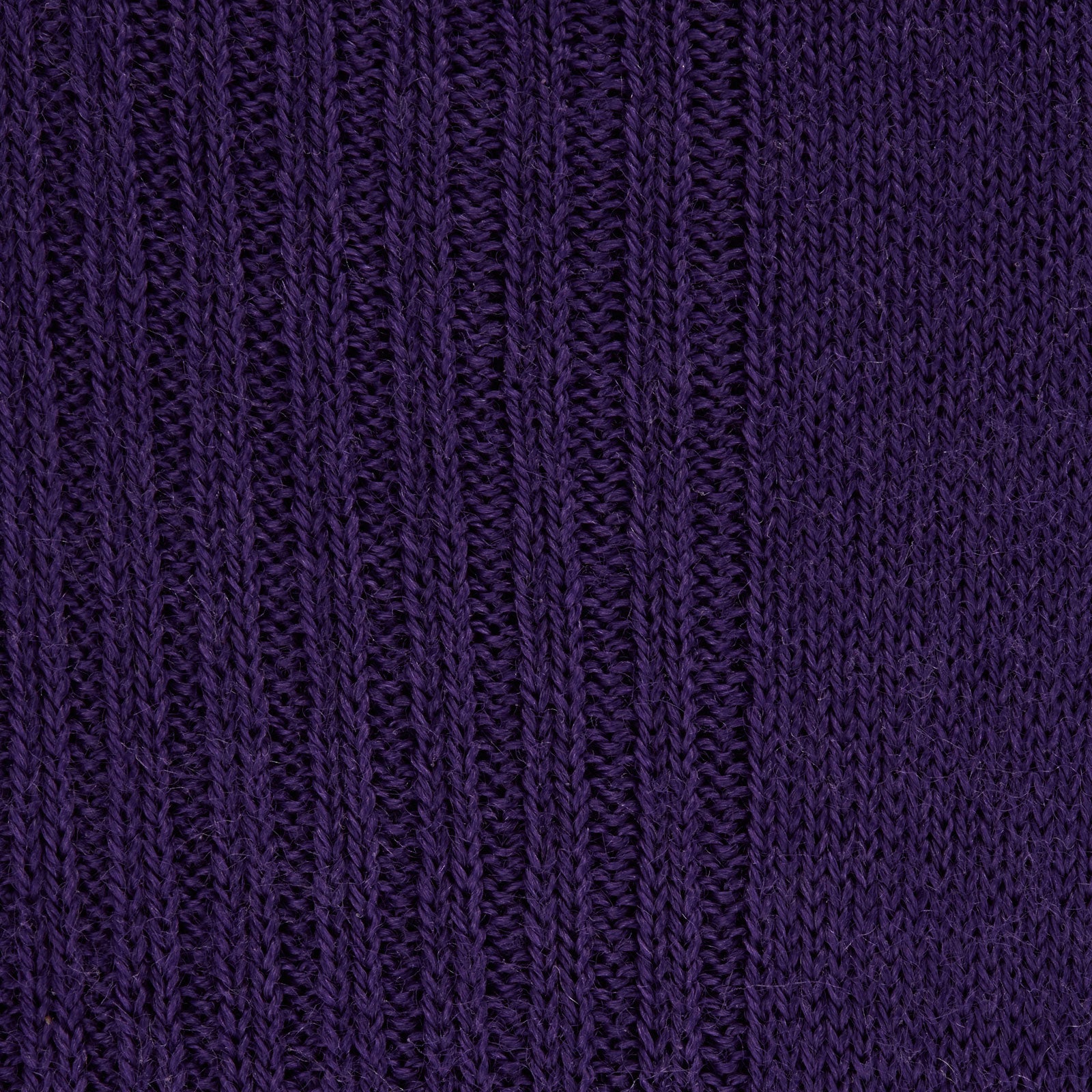 View 2 of product A single Turnbull & Asser Dark Purple Mid-Length Merino Wool Sock stands upright on a plain light gray background, showcasing its ribbed texture and reinforced toe and heel for premium quality.