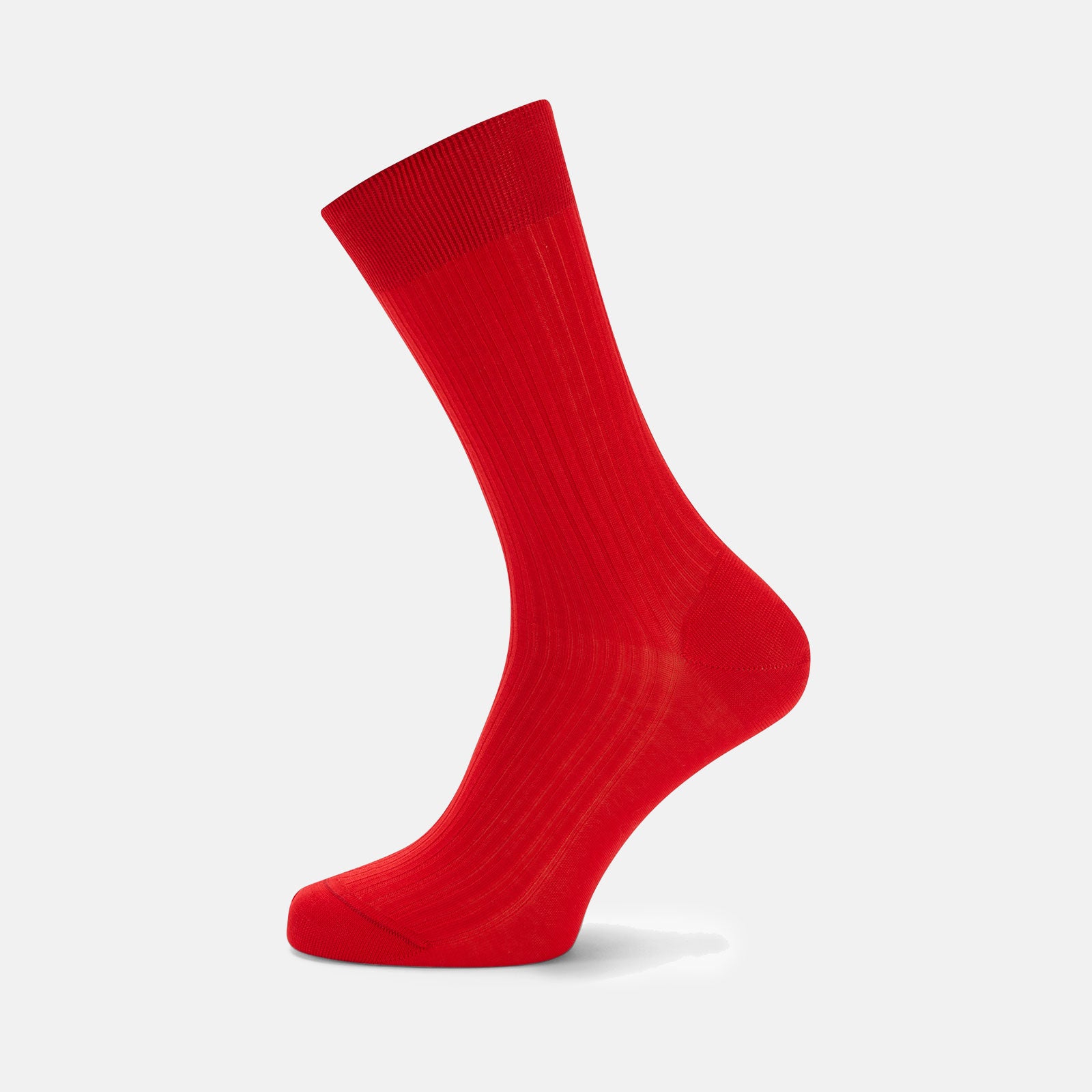 View 1 of product A single Scarlet Short Cotton Sock by Turnbull & Asser, in bright red, stands upright on a light gray background, displaying its side view and ribbed texture.