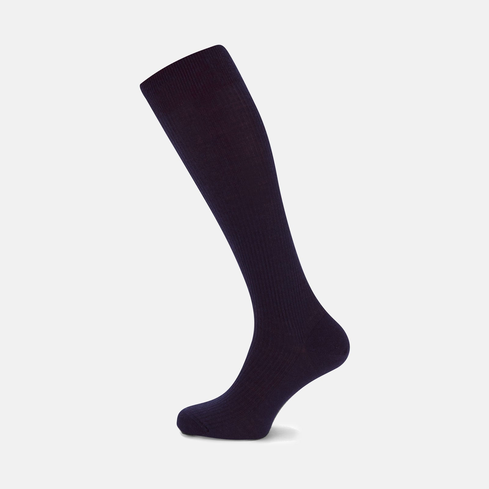 View 1 of product A single Deep Navy Long Merino Wool Sock by Turnbull & Asser is shown on a mannequin leg against a plain light gray background.