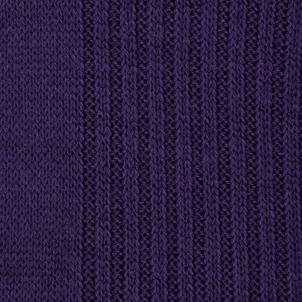 A single Purple Long Merino Wool Sock by Turnbull & Asser is showcased on a foot-shaped mannequin against a white background, highlighting the luxurious craftsmanship of premium men’s socks.