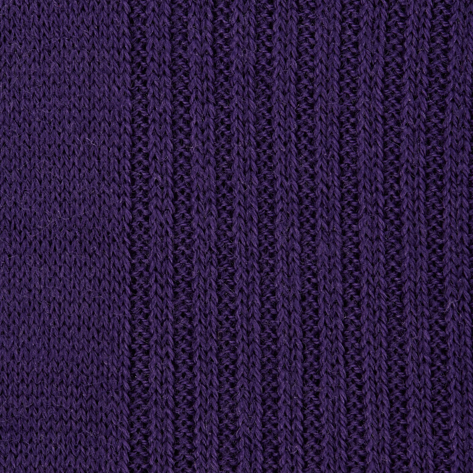 View 2 of product A single Purple Long Merino Wool Sock by Turnbull & Asser is showcased on a foot-shaped mannequin against a white background, highlighting the luxurious craftsmanship of premium men’s socks.