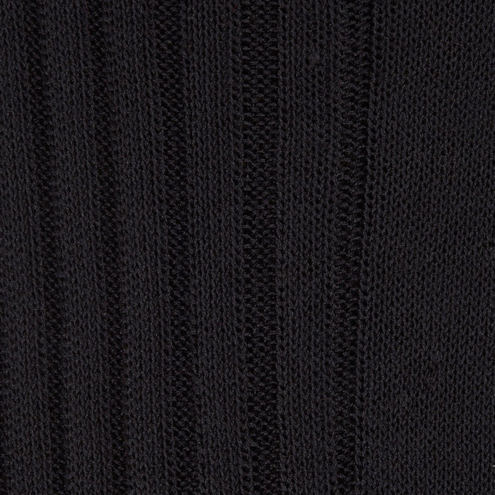 A single Black Long Cotton Sock by Turnbull & Asser, shown knee-high in black with a subtle ribbed texture, is displayed in a side profile against a plain white background.