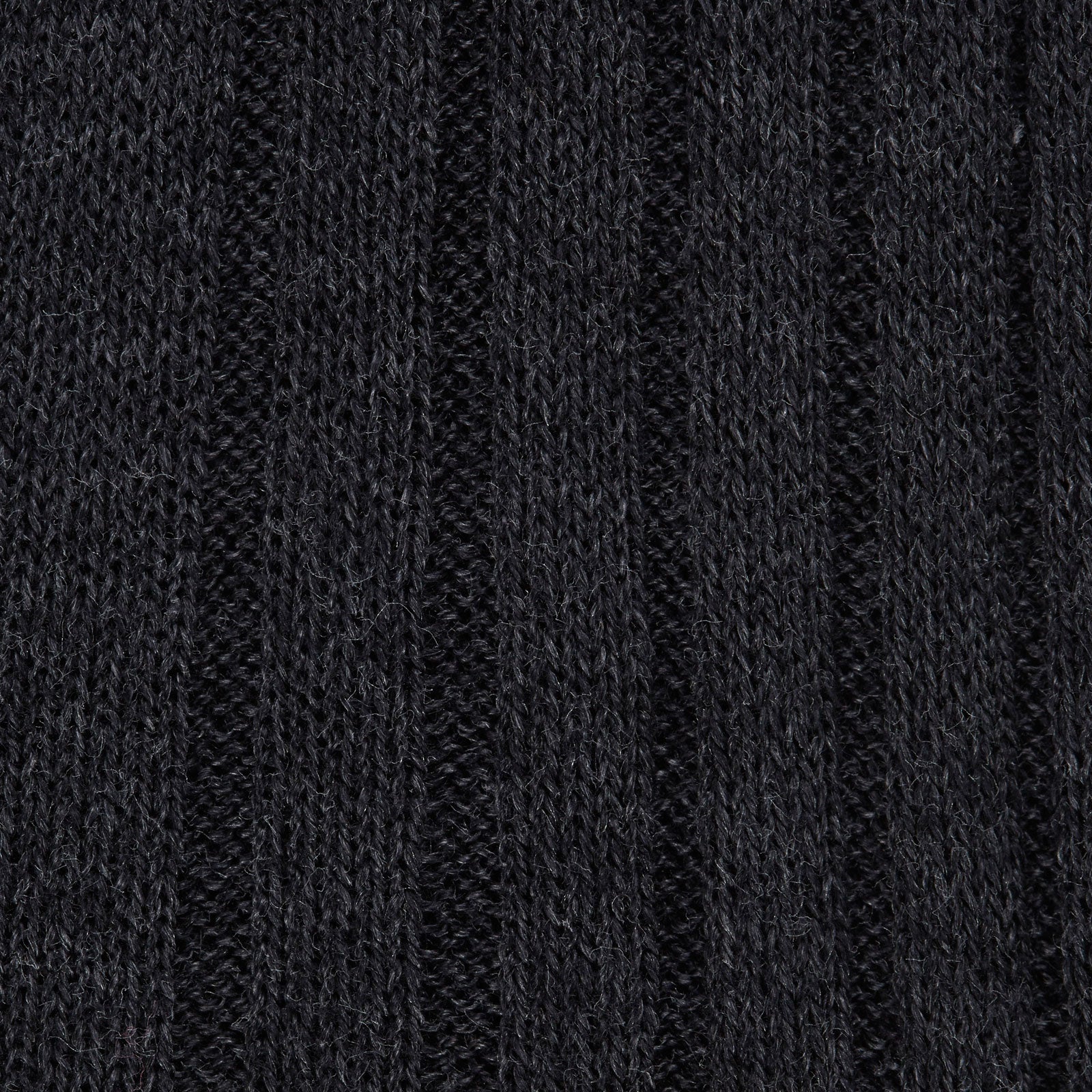 View 2 of product A single Turnbull & Asser Dark Grey Long Cotton Sock is shown in side view against a white background, with the toe pointing right and the cuff at the top.
