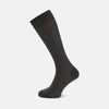 View 1 of product A single Turnbull & Asser Dark Grey Long Cotton Sock is shown in side view against a white background, with the toe pointing right and the cuff at the top.