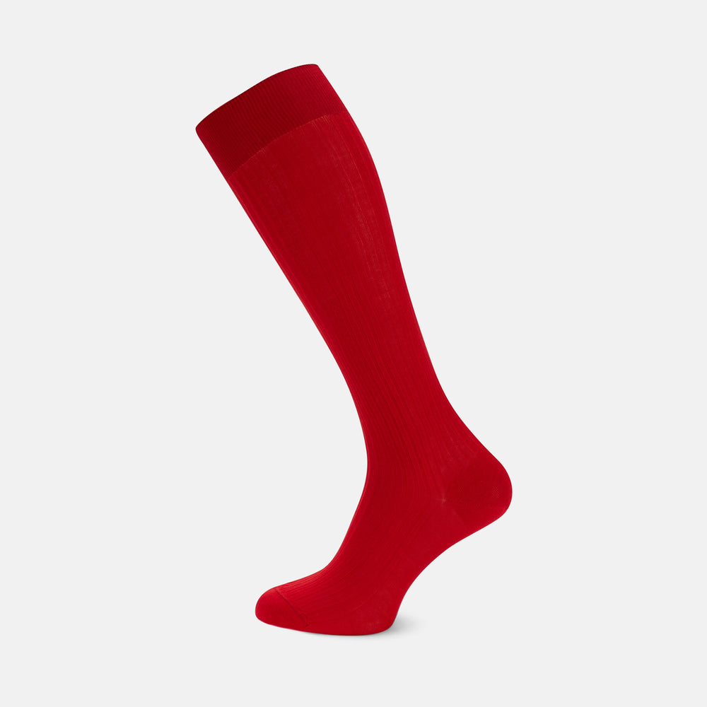 A single Scarlet Long Cotton Sock by Turnbull & Asser, crafted from fine Egyptian cotton in bold red, is displayed upright on a plain light gray background.