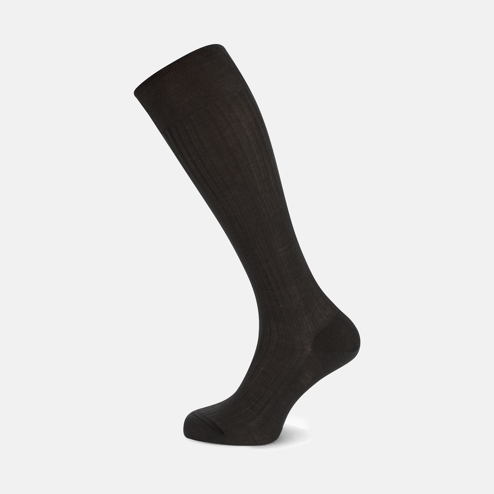 View 1 of product A single Charcoal Long Cotton Sock by Turnbull & Asser, in black Egyptian cotton, is shown against a plain white background at an angle with the foot pointing downward and the leg extending upward.