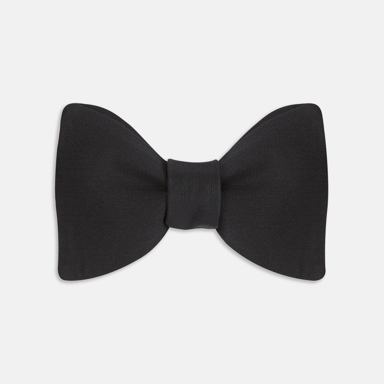 View 1 of product The Turnbull & Asser Black Barathea Bow Tie, made from luxurious silk with a classic, symmetrical shape, is displayed against a plain white background—ideal for formal occasions.
