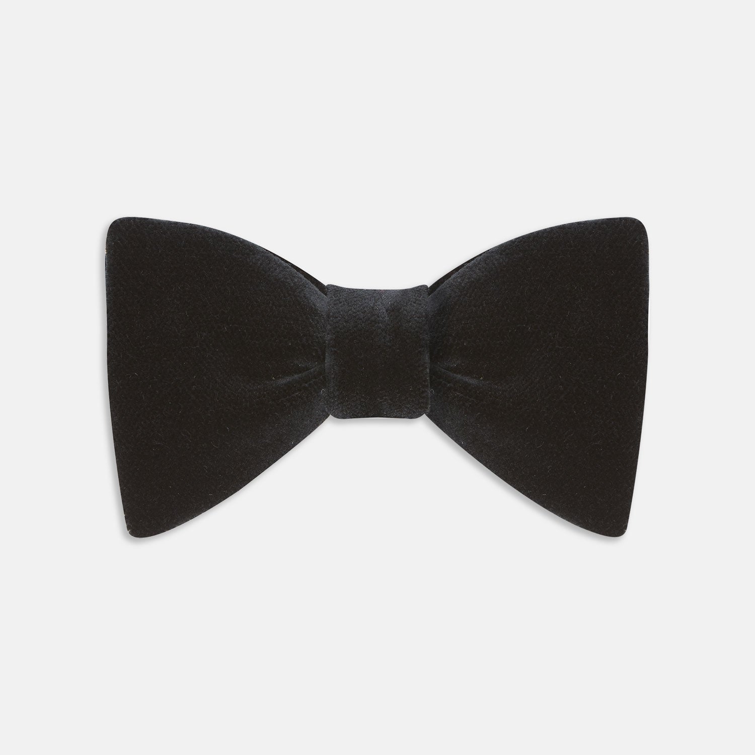View 1 of product The Turnbull & Asser Black Velvet Bow Tie, shown against a plain white background, is an elegant choice for formal occasions.
