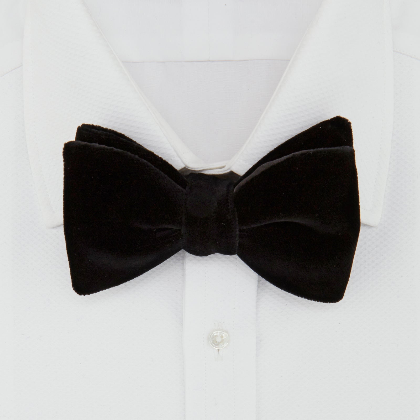 View 2 of product The Turnbull & Asser Black Velvet Bow Tie, shown against a plain white background, is an elegant choice for formal occasions.