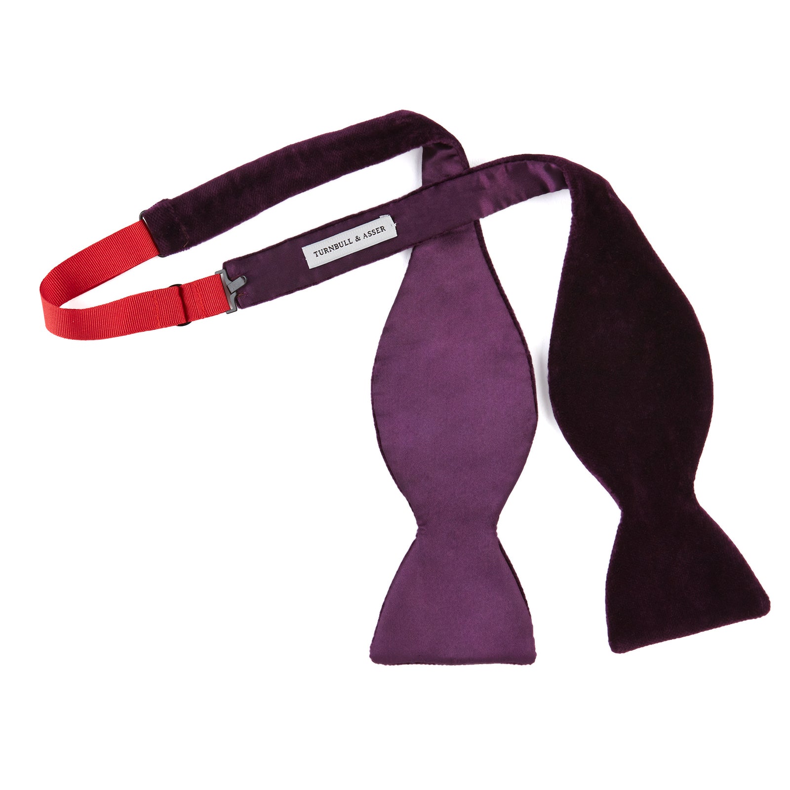 View 3 of product The Turnbull & Asser Purple Velvet Bow Tie is showcased on a plain white background, offering an elegant accessory to elevate any formal outfit with sophistication.