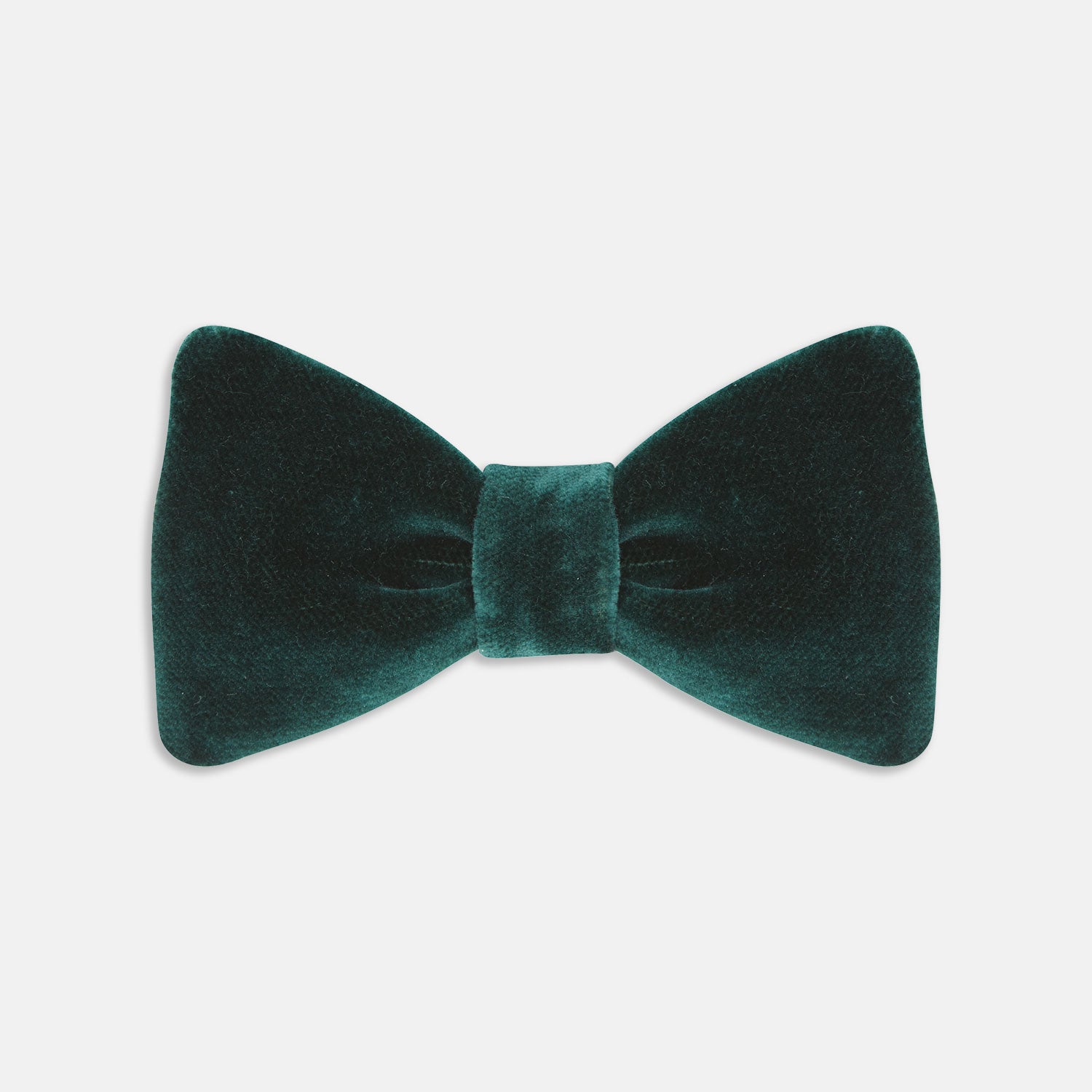 View 2 of product The Turnbull & Asser Green Velvet Bow Tie features a rich dark green hue and plush, smooth texture, ideal for formal events. Shown here against a plain white background.