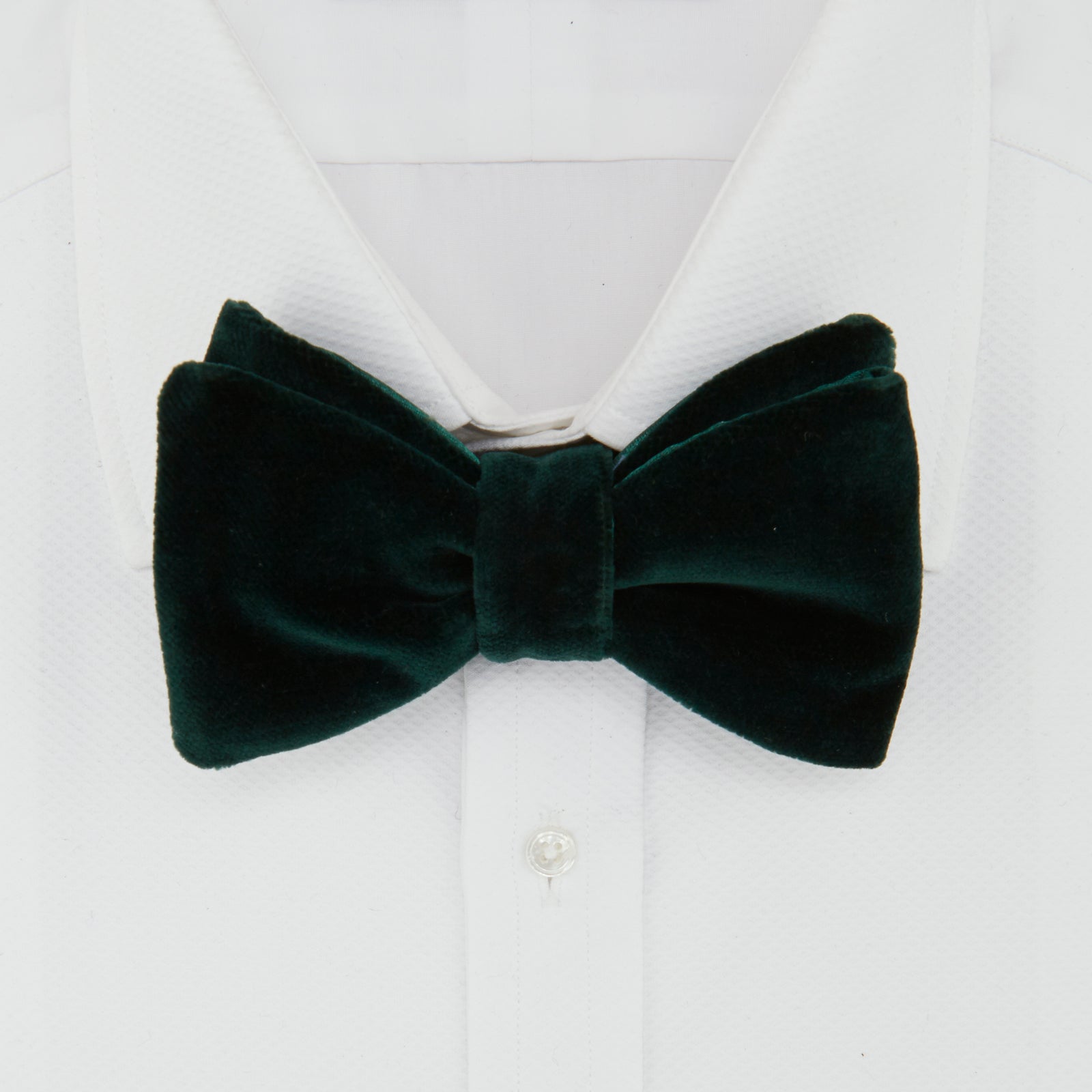 View 2 of product The Green Velvet Bow Tie by Turnbull & Asser, ideal for formal events, is displayed against a plain white background.