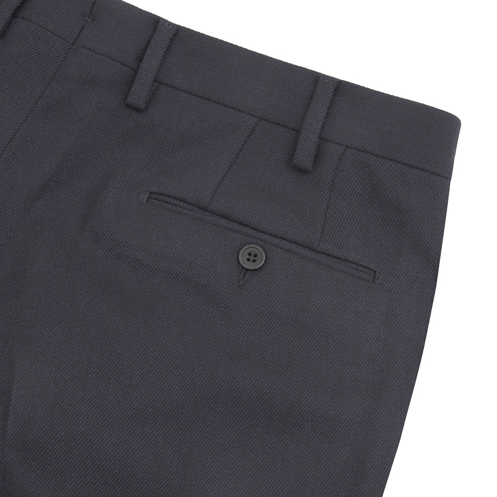 The Turnbull & Asser Jackson Navy Wool Trousers are tailored formal trousers in dark navy, featuring a button and zip closure, front pockets, and belt loops, shown against a plain white background.