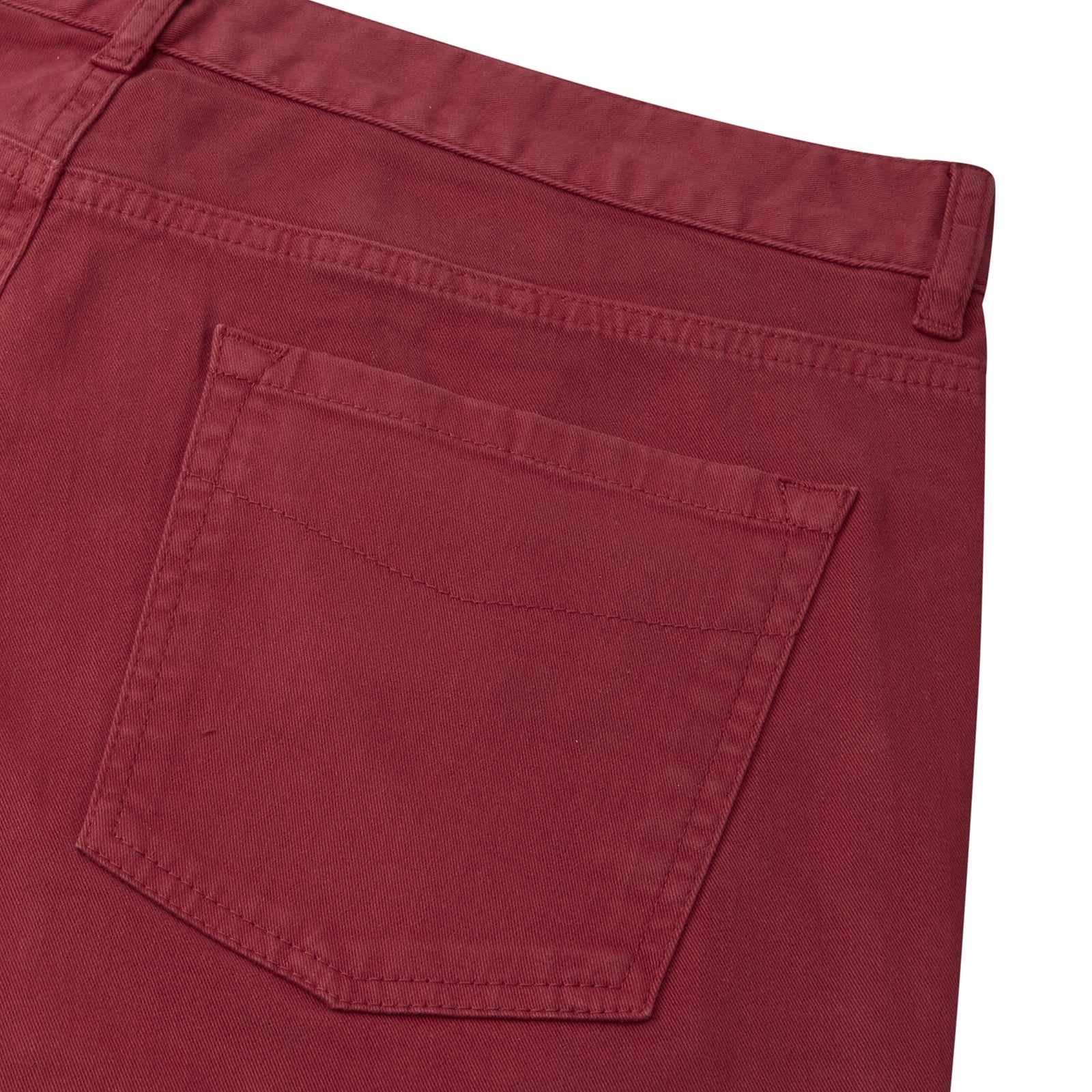 View 2 of product The Burgundy Cotton Five Pocket Trousers by Turnbull & Asser are slim-fit, smart-casual Italian cotton twill trousers with five pockets, belt loops, and a button closure, shown laid flat on a white background.