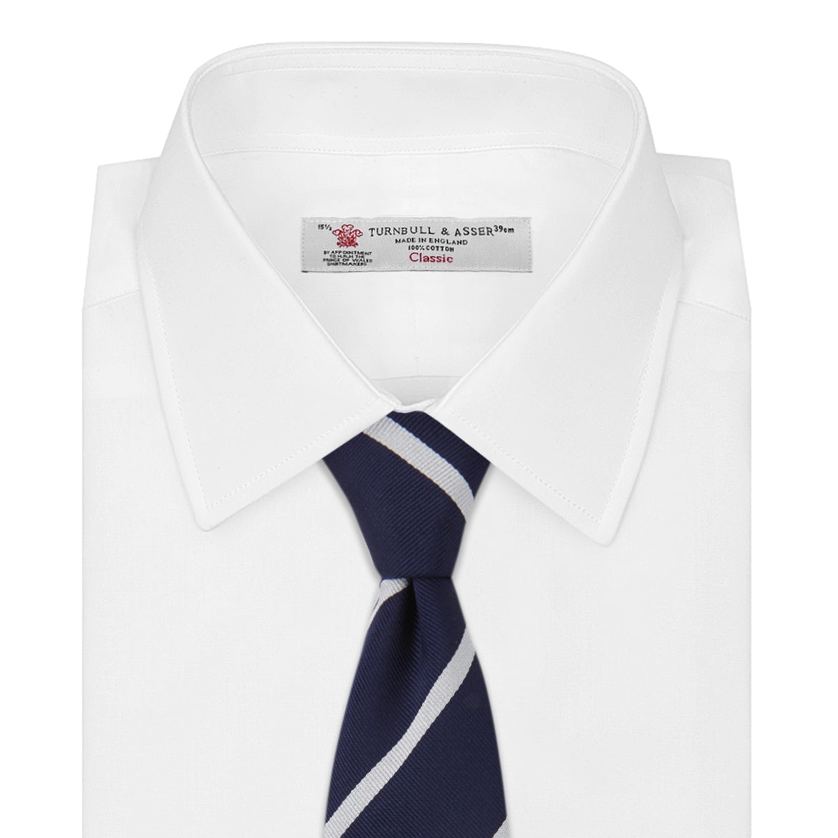 View 2 of product The Turnbull & Asser Seven-Fold Navy and White Blazer Stripe Repp Silk Tie, elegantly rolled at one end, is displayed on a plain white background.