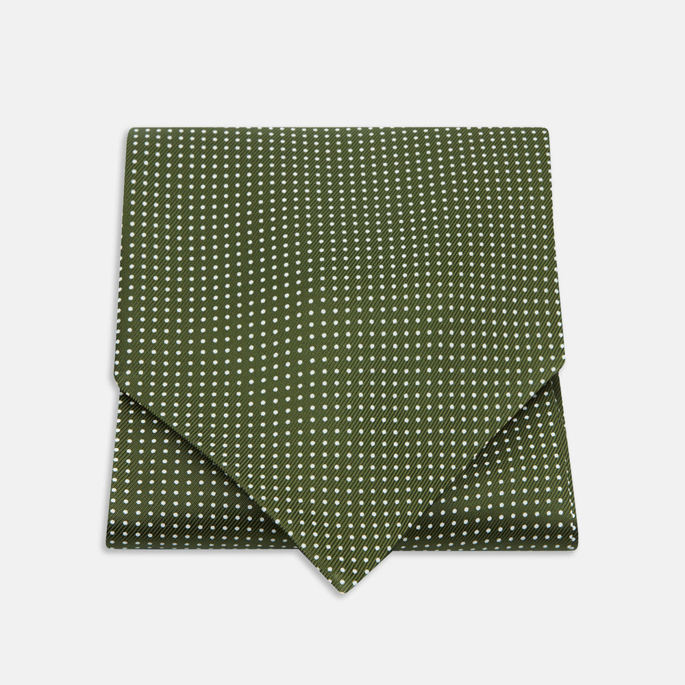 The Turnbull & Asser Olive Green and White Small Spot Silk Ascot Tie is a stylish accessory for wedding guests, featuring a classic pattern that pairs perfectly with a matching pocket square.
