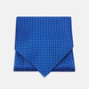 View 1 of product The Turnbull & Asser Royal Blue and White Small Spot Silk Ascot Tie, featuring fine white dots on blue silk, is shown on a plain white background—an elegant finishing touch for any wedding guest outfit.
