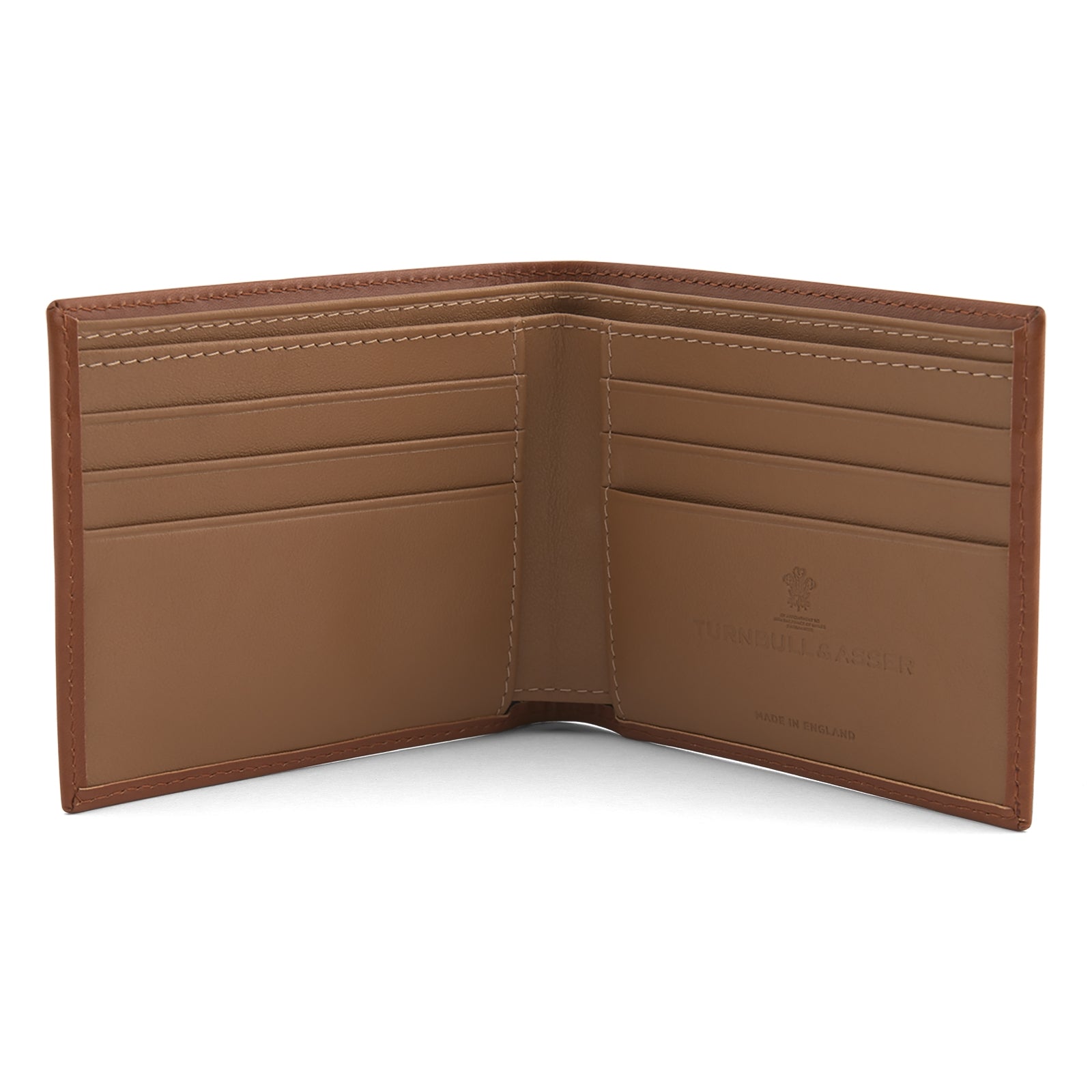 View 2 of product A closed Light Tan Leather Billfold by Turnbull & Asser stands upright against a plain white background, showcasing visible edge stitching and a smooth, minimalist design.
