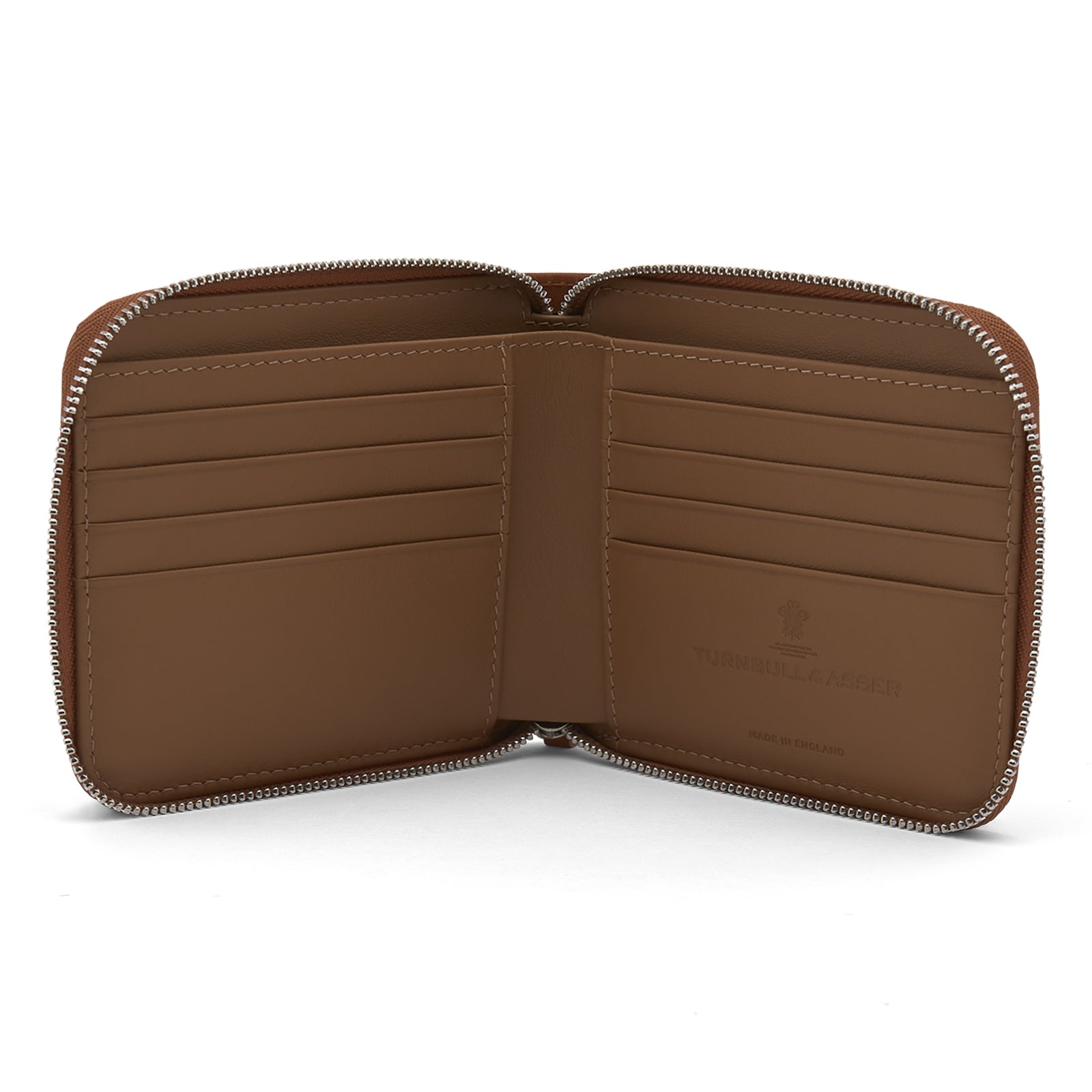 View 2 of product The Light Tan Leather 8 C/C Zipped Wallet by Turnbull & Asser, with a smooth square design, features a leather pull tab and zipper along two sides. It is shown closed against a plain white background.
