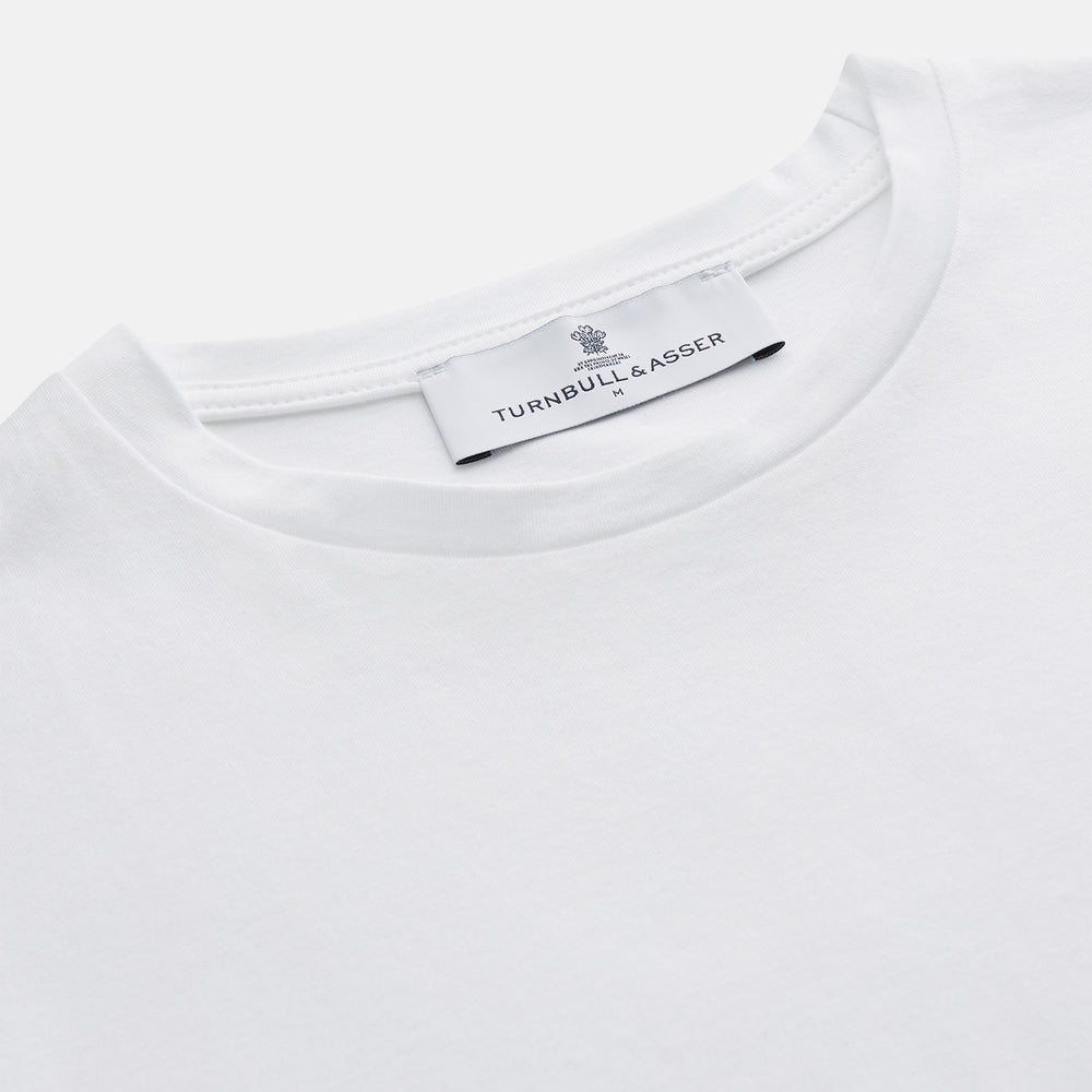 The Turnbull & Asser White Davey Cotton T-Shirt is shown on a white background. Crafted from fine-gauge jersey, it features short sleeves, a classic crew neck, and a clean front with no visible logos or designs.