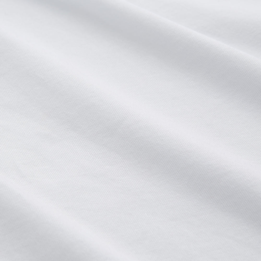 The Turnbull & Asser White Davey Cotton T-Shirt is shown on a white background. Crafted from fine-gauge jersey, it features short sleeves, a classic crew neck, and a clean front with no visible logos or designs.