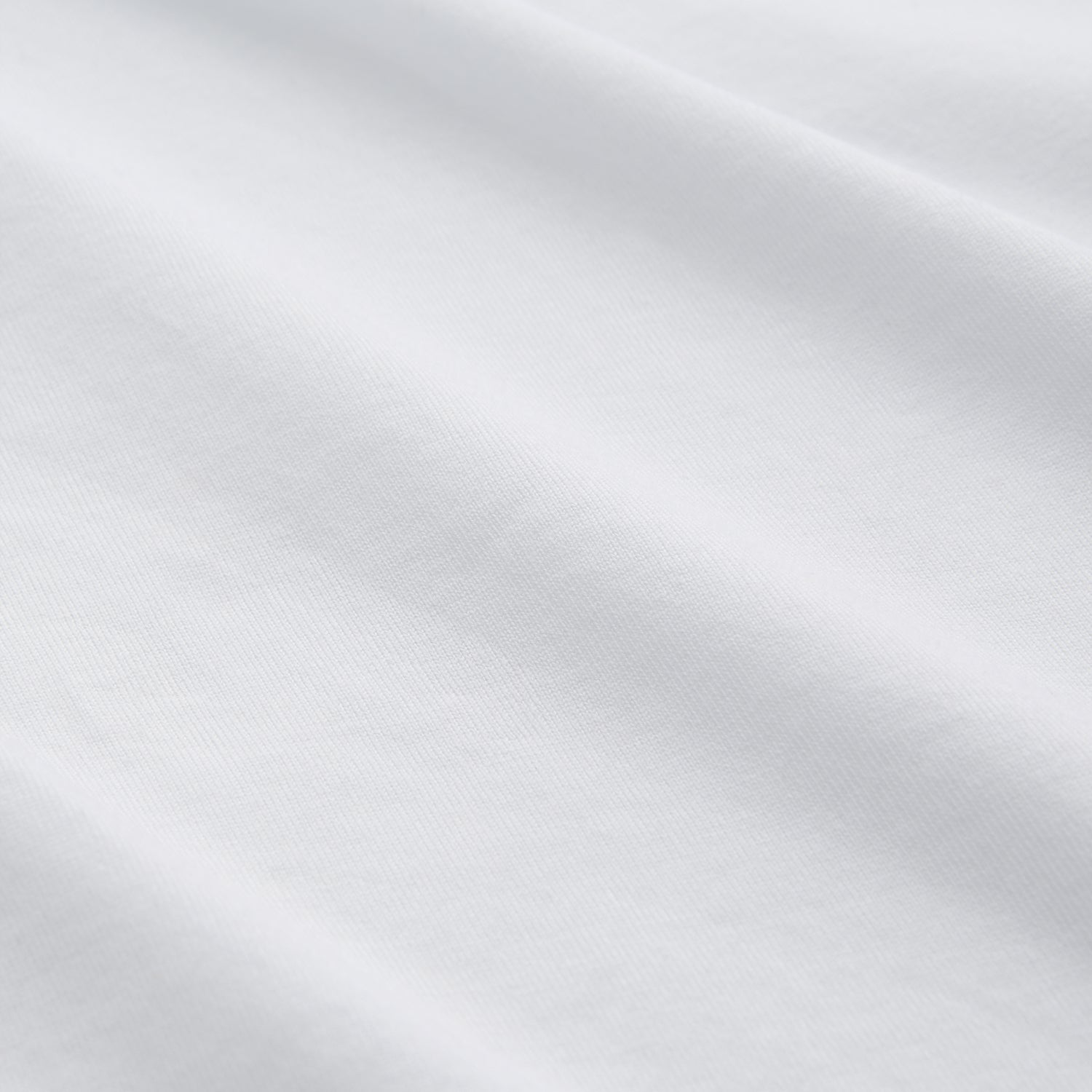 View 5 of product The Turnbull & Asser White Davey Cotton T-Shirt is shown on a white background. Crafted from fine-gauge jersey, it features short sleeves, a classic crew neck, and a clean front with no visible logos or designs.