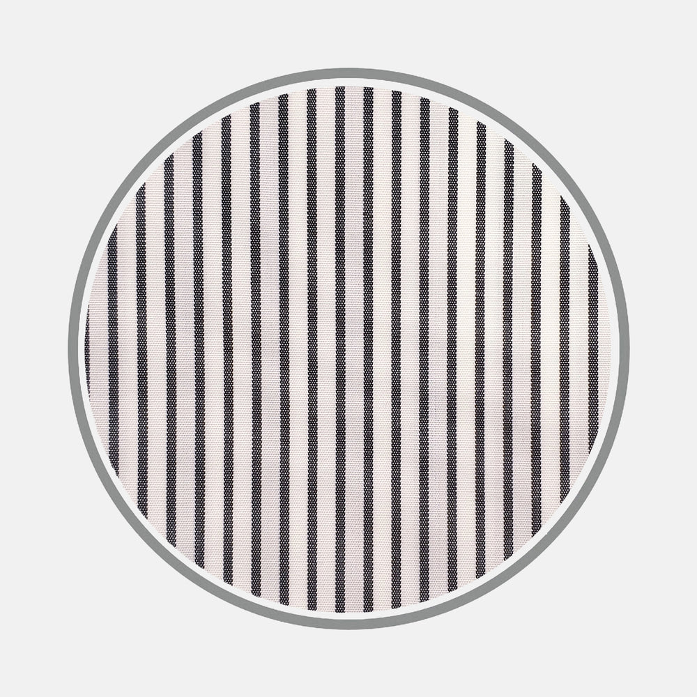 A circular swatch of Turnbull & Asser Black Half Bengal Stripe Cotton Fabric, featuring fine vertical black stripes and a gray border on white background—ideal for made to measure shirts.