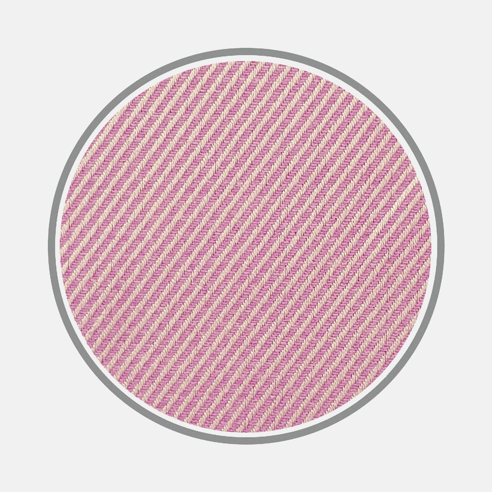 A detailed view of Turnbull & Asser's Lilac Fine Twill Cotton Fabric, featuring soft pink and white diagonal stripes, displayed within a circular frame on a white background.